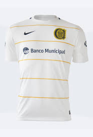 Es ist fast vollständig gelb mit marineblauen akzenten in form des kragens und der ärmelbündchen sowie der markenlogos auf der. Rosario Central 2015 16 Auswarts Trikot