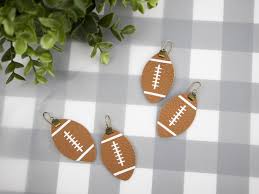 This is a sponsored conversation written by me on behalf of cricut. Leather Football Earrings With A Free Cut File Clumsy Crafter
