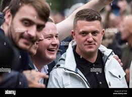 London, UK. 7th October, 2017. Stephen Christopher Yaxley-Lennon, better  known as Tommy Robinson, co-founder and former leader of the English  Defence League, meets supporters of the Football Lads Alliance (FLA) before  the