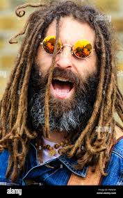 Close up, portrtait of Shane Warman of the rock band Rudy Warman and the  Heavy Weather, singing at concert in open-air. Face, dreadlocks and beard  Stock Photo