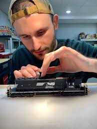 What's your most recent custom locomotive build using a ScaleTrains.com  model? Arthur from BradleyDCC enjoyed building two custom Norfolk Southern  High Hood SD40-2s from our recent run of N&W versions last year.