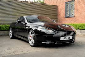 Image result for Jet Black 2010 Aston Martin