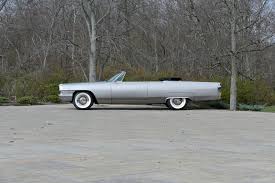 Image result for Starlight Silver 1965 Cadillac