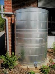 The downspout is cut to a height that permits the rain water to flow into a barrel placed beneath it. Rainwater Systems Higher Ground Rainwater Systems Of Asheville Nc