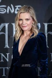 And 35 years on, the actress is reflecting on playing cocaine addict housewife elvira in the al pacino classic, admitting she was 'starving' while making the movie. Michelle Pfeiffer Navy Velvet Long Sleeve Celebrity Dress Maleficent Premiere