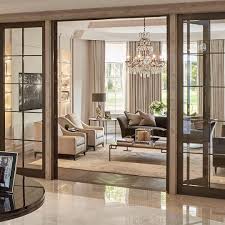 Louise Bradley On Instagram Bronze Doors And Stone Architraves Divide The Entrance In 2020 Luxury House Interior Design Luxury Living Room Luxury Living Room Design
