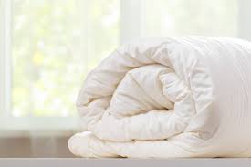 How To Wash A Comforter | The Best Way To Clean A Comforter - The Maids