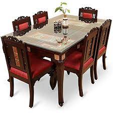 These dining tables are known for their quality, durability and stylish yet simple designs. Exclusivelane Teak Wood Table And Chair With Warli And Dhokra Work 6 Seater Dining Set Amazon In Electronics