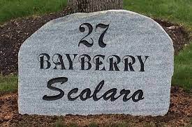 1) a granite boulder that looking for 2 items : Granite Signs Vozzella Granite Industries