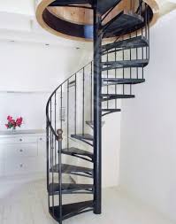 In addition to being a great metal outdoor spiral staircase option, wood accents, custom handrails, and powder coated finishes allow these metal spiral stairs to be warmer and more decorative indoor stairs. Spiral Staircase Dh58 Escaliers Decors Contemporary Metal Frame Metal Steps
