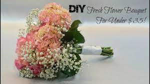 First, place the shiny side of the ribbon facing the stems so that the matte side is visible. Diy Vintage Fresh Flower Bridal Bouquet For Under 35 Fresh Flower Arrangement Diy Tutorial Youtube