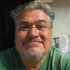 Is it safe to start a portable generator while it is still plugged into an  RV?