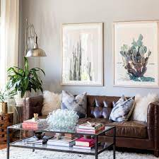 The next step is the most crucial; Art Hanging Mistakes To Avoid Illustrated By Gifs Apartment Therapy