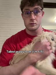 Meet the Tallest Puppy Lover at 6'4"