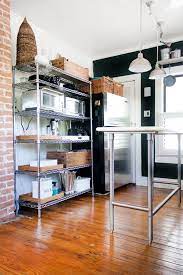 Coming with metal as its main material, this type of kitchen shelves is really strong and has a tough personality. 12 Smart Ways To Use Wire Shelves In Your Kitchen Small Kitchen Layouts Kitchen Layout Small Kitchen Storage