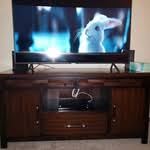 Slumberland furniture carries a full inventory of tv stands, consoles, and entertainment centers to show off or conceal your television while also complimenting. Dream Weaver Cherry 60 Tv Console Bob S Discount Furniture