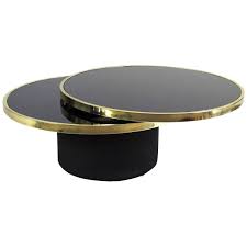 New spec cota chrome frame and glass 3 tier swivel motion coffee table. Dia Round Swivel Top Black Glass Coffee Table 1stdibs Com Black Glass Coffee Table Glass Coffee Table Coffee Table