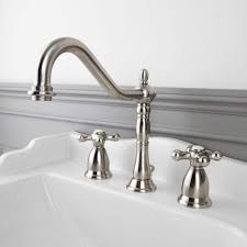 For a more traditional look, go for a widespread faucet that separates your temperature controls into two. Victorian Widespreace Bathroom Faucet Metal Cross Handles