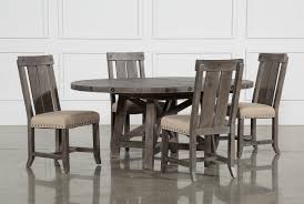 It is where you'll sip your morning coffee with newspaper in hand, or where the kiddos will spend hours knocking out homework. Jaxon Grey 5 Piece Round Extension Dining Set With Wood Chairs Living Spaces