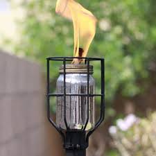 Diy Industrial Style Tiki Torch How How To Make An Industrial Style Tiki Torch With A Few Supplies From The Hardware Tiki Torches Tiki Torches Diy Tiki Lights