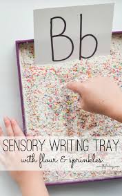Sensory Writing Tray With Flour Sprinkles Lots Of Sensory Input Whilst Practi Letter Recognition Activities Teaching Letter Recognition Multisensory Writing