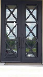 This traditional iron door makes for an elegant addition to any home. 22 Stunning Black Front Door Inspirations Thetarnishedjewelblog