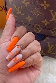 Another cute long acrylic nails can be achieved by painting your square coffin nails with a bright orange color. Long Acrylic Nails