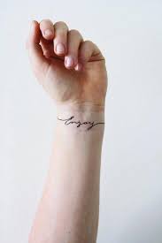 Small wrist quote tattoos are really popular. Enjoy Temporary Tattoo Set Typography Temporary Tattoo Etsy Wrist Tattoos Words Wrist Tattoos For Women Tiny Wrist Tattoos