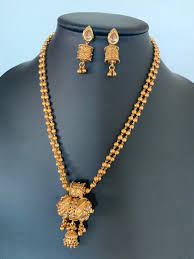 Gold Finished Pendant Set With Matching Jhumka Earrings Bridal Jewelry Temple Jewelry Bridal Jewelry Pendant Set Gold Fashion Necklace Gold Necklace Indian Bridal Jewelry Gold Jewellery Design Necklaces