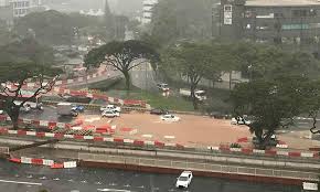 Stormy weather involving loud & frequent cracks of thunder and streaks of lightning lit up dark cloudy skies across central, west and east areas. Under The Angsana Tree Worst Flash Floods In 30 Years