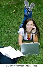 Huge collection, amazing choice, 100+ million high quality, affordable rf and rm images. Cute Teen Girl On The Phone Laying Down On The Grass Studying Cute Teen Girl Laying Down On The Grass Studying With Her Canstock