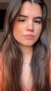 Captivating Indoor Portrait of a Person in an Orange Top