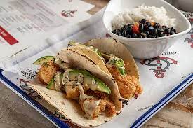 One of my favorite treats to eat there is the mousse (though the beignets are incredible). Gulf Fish Tacos With Grumbles Rice And Black Beans Picture Of Grumbles Seafood Company Port Aransas Tripadvisor