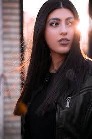 Woman Posing by Window with her Reflection · Free Stock Photo