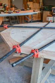 Weighed down pins, bowling balls have stainless steel ball inside. Salvaged Wood Beam Round Dining Table The Created Home