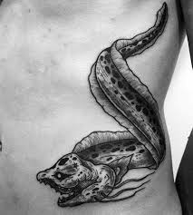 60 Eel Tattoo Designs For Men Elongated Fish Ink Ideas Lion Tattoo Sleeves Ocean Sleeve Tattoos Tattoo Designs Men
