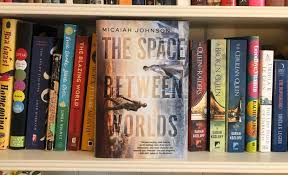 But on the eve of her sixteenth birthday, her perfect little world shatters. Nerdette Book Club Micaiah Johnson S The Space Between Worlds Wbez Chicago