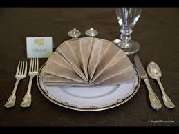 Formal place setting, try tucking menus into a pocket created with a diamond pouch fold. Calgary Catering Tips Video Guide To Napkin Folding