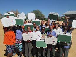 San Children Of Donkerpos School In Namibia Show Off Their Lap Desks Donated By Bank Windhoek The Lap Desks Are Printed One One Side Children Lap Desk Namibia