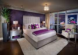 Just a touch of purple in the bedding and the room takes on a whole new vibe. Colors That Go With Purple How To Decorate With This Color Purple Bedrooms Purple Master Bedroom Bedroom Color Combination