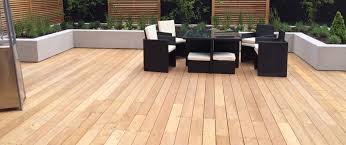 If you like to lounge on your patio, without prying eyes,try outdoor privacy screens. Garapa Decking And Cedar Screens Create A Modern Family Garden Silva Timber