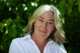 Hello fellow gardeners. This is sort of a gardening query so please forgive  me if it isn't the place to ask I imagine many of you out there have dogs?  We have