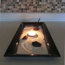 Sprinkle more snow on table around the base of the arrangement to resemble a snow drift, light candles dip coffee filters in fabric dye for a trendy ombre effect, then stack them to create a. Zen Garden With Candle Holder Centerpiece From Minizengarden On