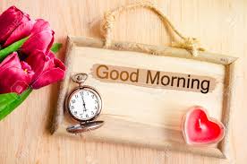 Maybe you would like to learn more about one of these? Good Morning Clock And Red Tulip With Red Candle Heart Shape On Wooden Background Stock Photo Picture And Royalty Free Image Image 44171251