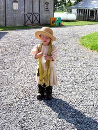 Elizabeth Just Wanting To Be Like Her Brothers Check Out The Hat Boots The Tie Down Strap Nickel Mi Amish Country Lancaster Pa Amish Country Amish