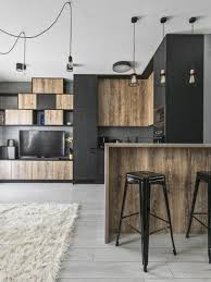 Eclectic modern design in dark tinctures. Small Industrial Apartment In Lithuania Gets An Inspiring Update Industrial Apartment Decor Industrial Apartment Small Industrial Apartment