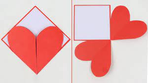 Write an 'i' and a 'u' on either side of the heart with a silver sparkle glitter pen and add another line of stitches around the edge. Diy How To Make Greeting Card With Heart Shape Design For Valentine S Day Youtube