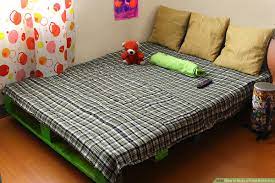 To make a full size bed frame out of pallets. How To Make A Pallet Bed Frame 6 Steps With Pictures Wikihow