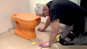 how to install laminate around a toilet