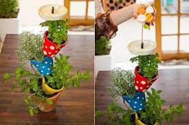 It would look great in a country style kitchen! Diy Vertical Herb Garden Made Of Pots Cute Idea For Your Kitchen